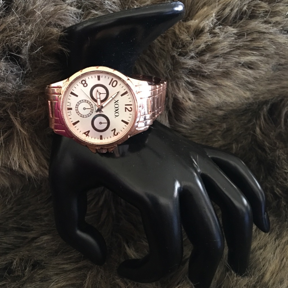 Women’s XOXO rose gold tone bracelet watch